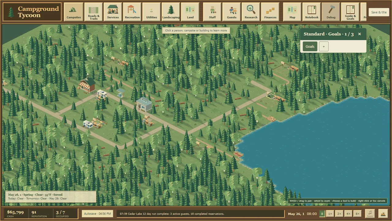 An isometric woodland campground with roads, campsites, service buildings and a lake.